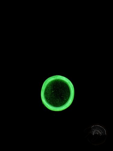 Zöld lencsés medál